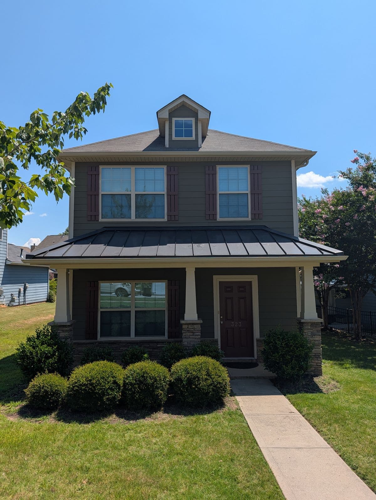 Finished exterior repaint of a two-story Simpsonville, SC rental home by TruCare Painters